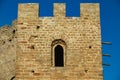 Castle battlements, merlons and window Royalty Free Stock Photo