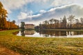 Castle behind the castle pond in autumn panorama Royalty Free Stock Photo