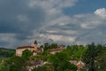 Castle on big hill in Vimperk town in spring sunny and cloudy day Royalty Free Stock Photo