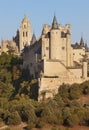 Castle and cathedral at sunset in Segovia. Alcazar Royalty Free Stock Photo