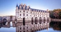 Castle or chateau de Chenonceau at sunset, France Royalty Free Stock Photo