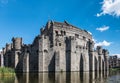 Castle of Gent behind its moad, Flanders, Belgium