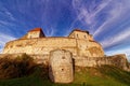 German Dark ages castle in soft sunlight by blue sky and Cirrus cloud