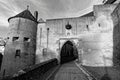 Dark ages castle entry with barbican monochrome image Royalty Free Stock Photo
