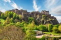 Castle hill in Edinburgh with green grass and blue sky, Scotland, UK Royalty Free Stock Photo