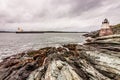 Castle Hill Lighthouse in Newport, Rhode Island, situated on a dramatic rocky coastline Royalty Free Stock Photo