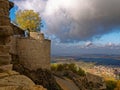 Medieval castle detail with view to town in valley Royalty Free Stock Photo