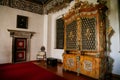 Castle interior, Baroque and renaissance furniture, golden hall, large wood carved inlaid cabinet with gilding, UNESCO World