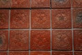 Castle interior. Brick clay floor. Ceramic floor tiles with a picture of a rose. Medieval castle Rozmberk nad Vltavou, South