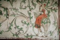 Castle interior, Fresco mural paintings with hunting scenes, floral ornaments, medieval wall and ceiling frescos, grand hall of