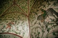 Castle interior, Fresco mural paintings with hunting scenes, floral ornaments, medieval wall and ceiling frescos, grand hall of