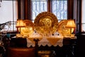 Castle interior, Large gold ceremonial dishes, crystal glasses, Christmas decorations, Historic Medieval Romantic castle Hradek u