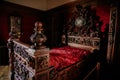 Castle interior, Retro style bedroom with baroque and renaissance furniture, red velvet, Castle Bouzov, Moravia, Czech Republic