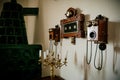 Castle interior, Retro style room with baroque and renaissance furniture and Very old Retro wooden telephone on wall, Castle