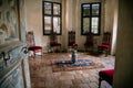 Castle interior, Retro style room persian rug, Chinese vase, carved wooden chairs, stained glass windows, UNESCO World Heritage