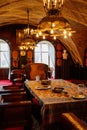 Castle interior, Secession arched painted ceiling, diningroom, metal aluminum tableware, armchair, dining table, openwork forged