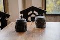 Castle interior. Vintage medieval cups standing on a wooden table. Medieval castle Rozmberk nad Vltavou, South Bohemia, Czech