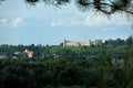 Castle in Janowice viewed from other side of WisÃâa river - Kazimierz Dolny. Surrounded by trees and forests. Royalty Free Stock Photo