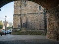Castle Keep of Newcastle Castle seen through Arch of rail bridge. Royalty Free Stock Photo