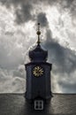 Historical clock tower with atmospheric sky