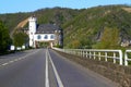 Castle of the Leyen, road passing the castle near Kobern Gondorf on the Moselle River, Germany.