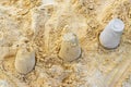 Castle made of white sand with buckets on beach Mexico Royalty Free Stock Photo