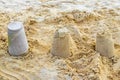 Castle made of white sand with buckets on beach Mexico Royalty Free Stock Photo