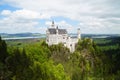 castle Neuschwanstein in the Alps and lake Forggensee in background (Bavaria, Germany) Royalty Free Stock Photo