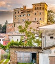 castle overlooking the colorful houses