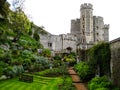 Castle palace with beautiful green garden in England Great Britain Royalty Free Stock Photo