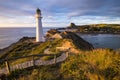 Castle Point Lighthouse, located near the village of Castlepoint in the Wellington Region of New Zealand Royalty Free Stock Photo