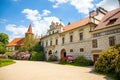 Castle with reflection in pond in spring time in Pruhonice, Czech Republic