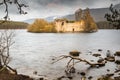 Castle Ruins on Loch an Eilein in Scotland. Royalty Free Stock Photo