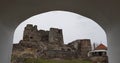 Castle ruins photo on cloudy day from the entry gate.