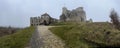 Castle ruins in Rabsztyn in Poland in foggy weather.