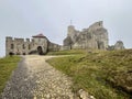 Castle ruins in Rabsztyn in Poland in foggy weather.