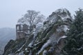 Castle ruins and tree next to rocks on a hill Royalty Free Stock Photo