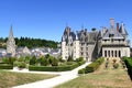 Castle, Saint-Jean-Baptiste church and the town of Langeais Royalty Free Stock Photo