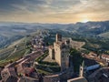 the castle of serralunga d\'alba taken from a drone with a view from above during a spectacular sunset Royalty Free Stock Photo