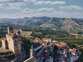 the castle of serralunga d\'alba taken from a drone with a view from above during a spectacular sunset Royalty Free Stock Photo