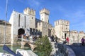 Castle in Sirmione - October 2, 2018: View to the medieval Rocca Scaligera castle 13th century in Sirmione town on Garda lake Royalty Free Stock Photo