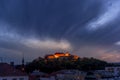 Castle Spilberk Brno city slow moving clouds captured just from castle turn public light on going from blue hour to night time Royalty Free Stock Photo