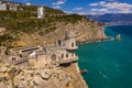 Castle Swallow`s Nest on a rock at Black Sea, Crimea. Castle is located in the urban area of Gaspra, Yalta. Aerial view Royalty Free Stock Photo