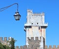 castle tower in beja, portugal (medieval european palace detail with stone wall crenellations, lantern) travel tourism Royalty Free Stock Photo