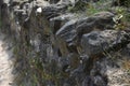 The castle wall of Nevitsky castle, Ukraine is laid out from stones