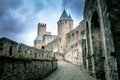 Castle walls of Carcassonne fortress in France with crowd clouds on the background Royalty Free Stock Photo