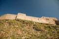 Castle walls on the rocks Royalty Free Stock Photo