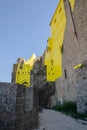 Yellow plastered walls of a castle of the fortress La CitÃÂ©, Carcassonne, France