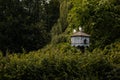 Castolovice, Czech Republic, 11 September 2021: Purebred pigeons sitting on fancy wooden dovecote at the country farm, free-