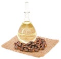 Castor oil with beans on sack Royalty Free Stock Photo